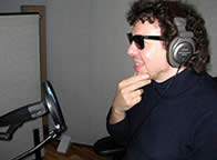 Alan Spencer Wearing Headphones and Shades
